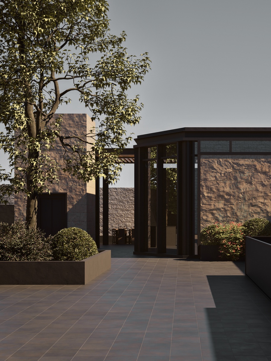 Stone exterior and planted approach at The Grounds of Jabal Amman